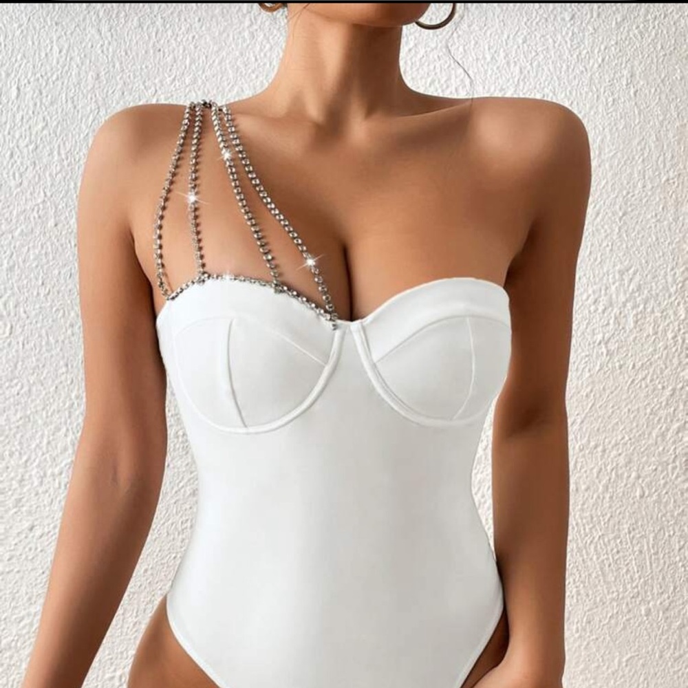 Elegant White Bodysuit with Rhinestone Straps